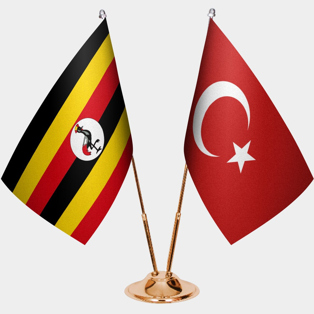 Uganda and Türkiye dual desk flag set with gold pedestal, satin office table flag