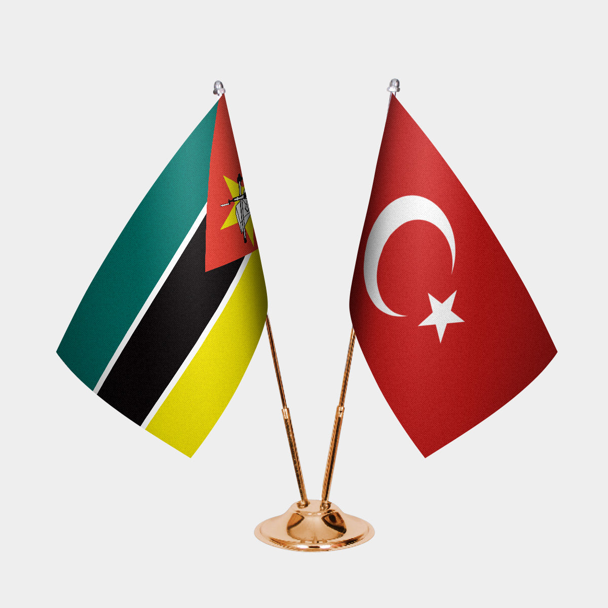 Mozambique and Türkiye dual desk flag set with gold pedestal, satin office table flag