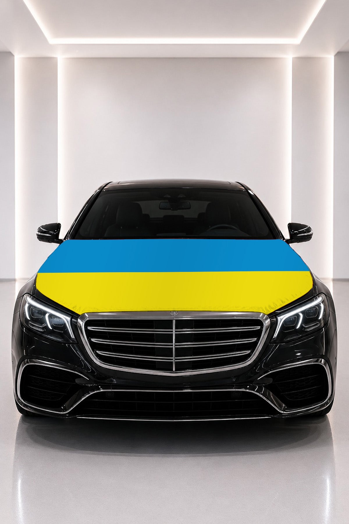 Ukraine flag car hood cover fitted on a black car bonnet