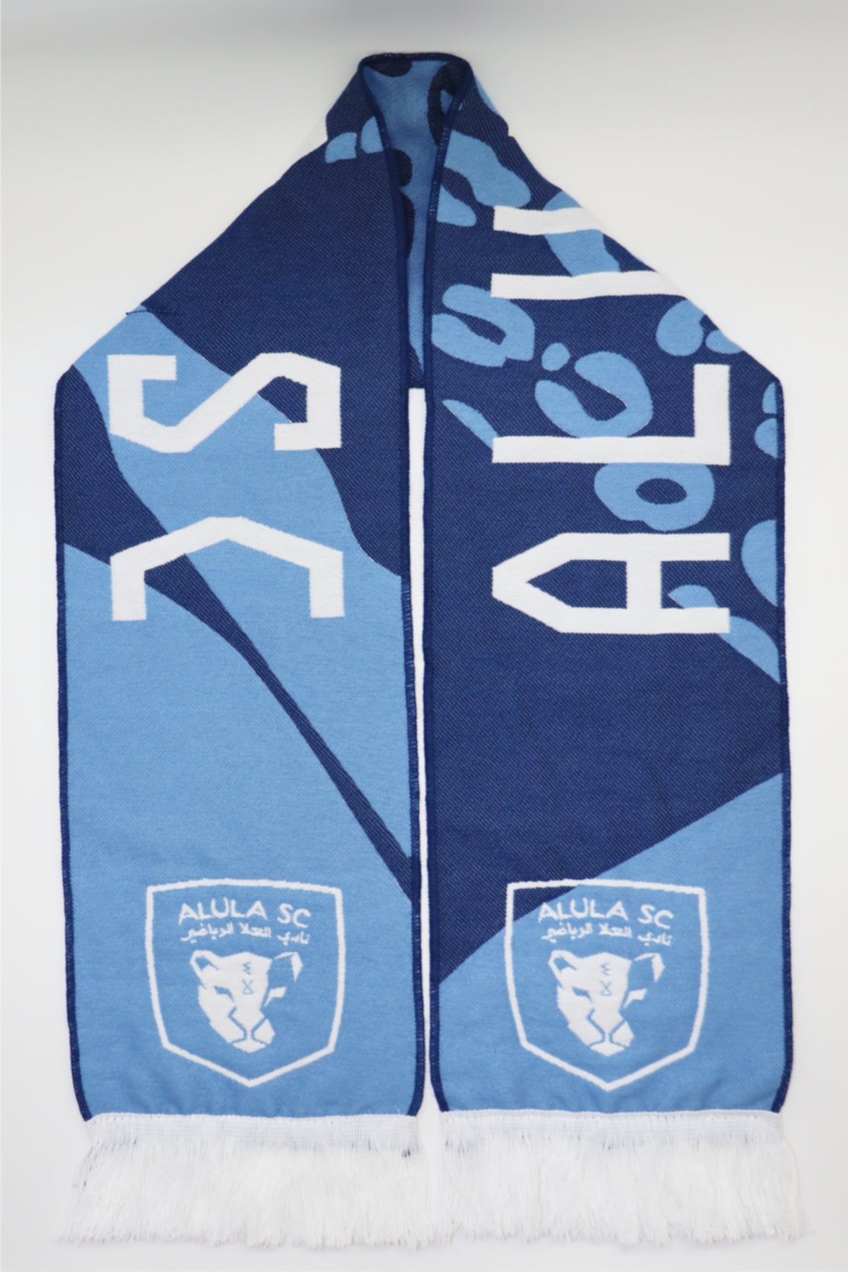 Alula SC custom woven football scarf — Saudi Arabian club design in light blue and navy with lion crest