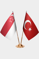 Singapore and Türkiye dual desk flag set with gold pedestal, satin office table flag