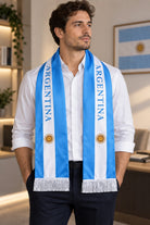 Argentina Flag Satin Soccer Scarf worn around the neck by a man in a white shirt