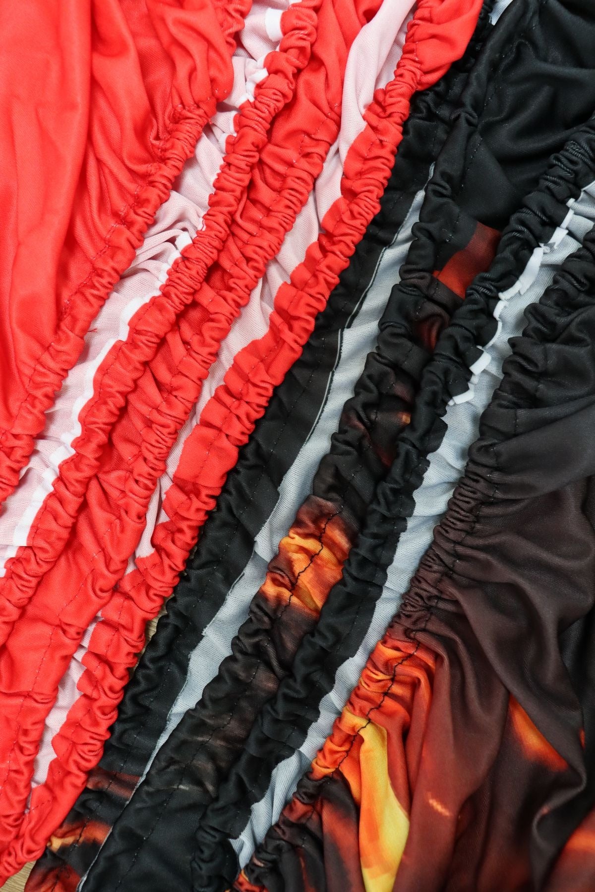 Car hood flag edge detail — fully elasticated hem that grips the bonnet