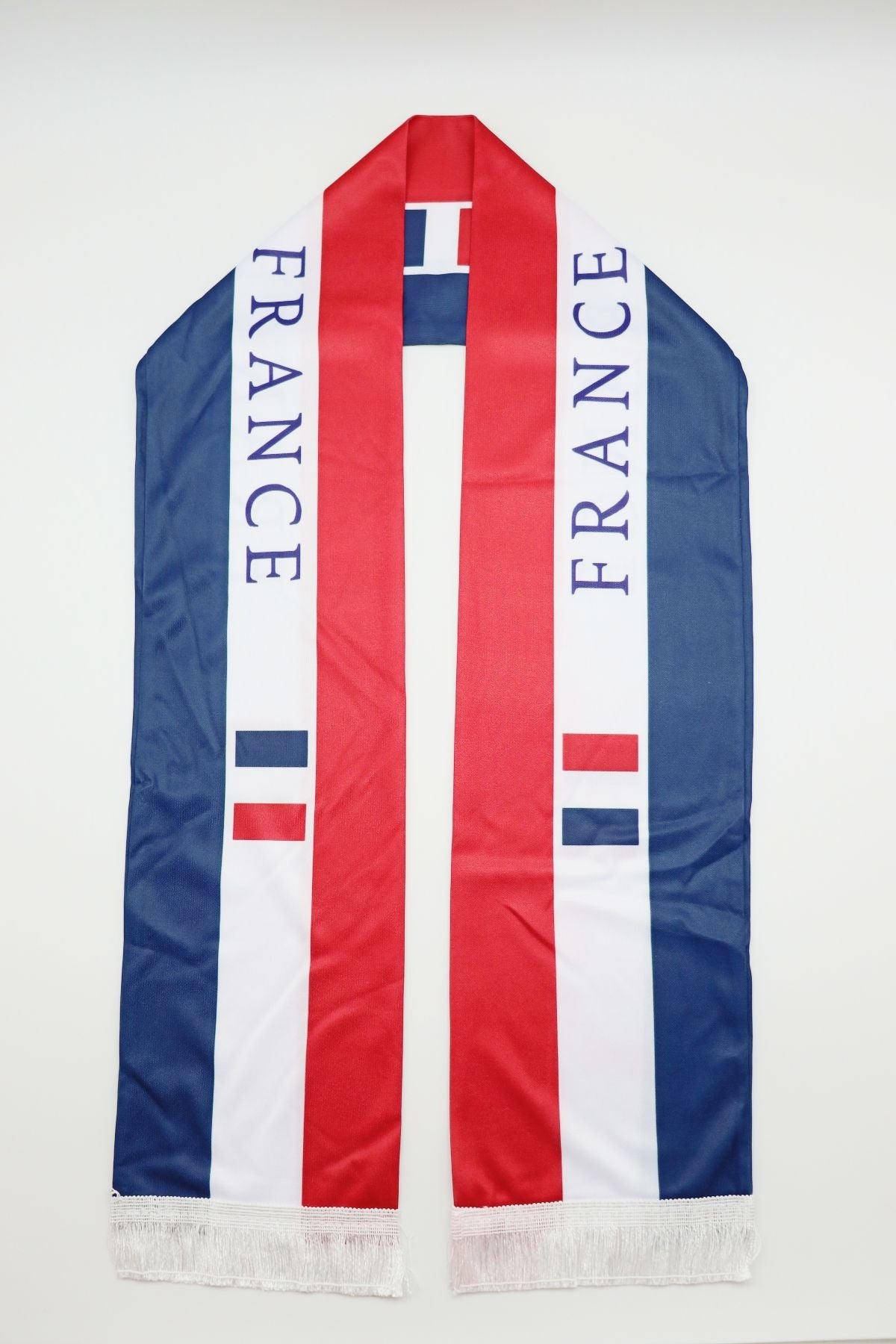 France Flag Satin Soccer Scarf laid flat, full length with FRANCE lettering and white fringes